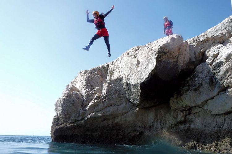 Coasteering (2) An Algarve guest leaping to clear Atlantic waters below