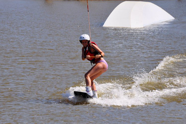 Wakeboarding (1) A sporty adventurer having fun on a Wakeboarding lesson