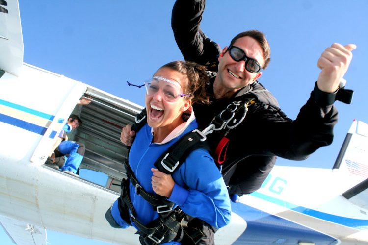 An Algarve guest skydives as a tandem with an experienced instructor