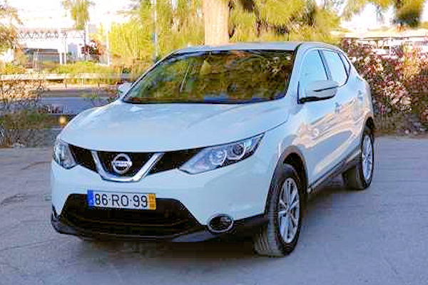 A white Nissan Qashqai sitting on the driveway at Zitauto