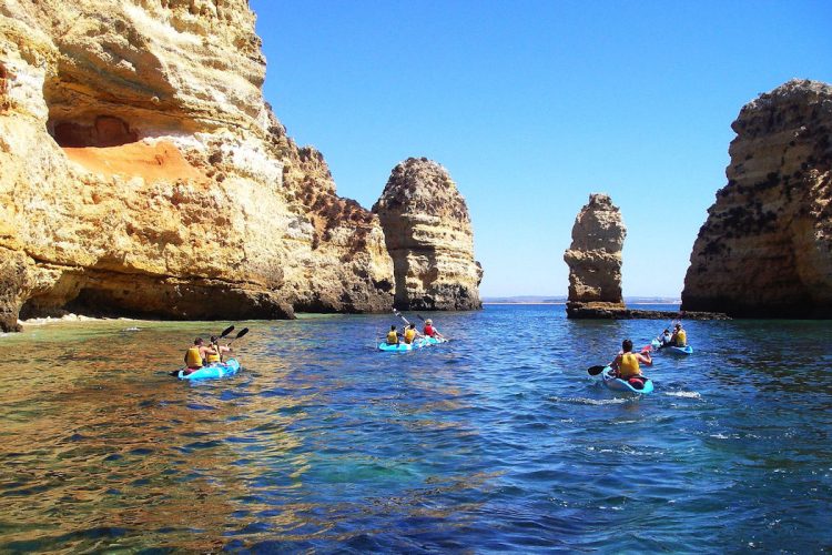 A guided Kayak tour through natural rock formations