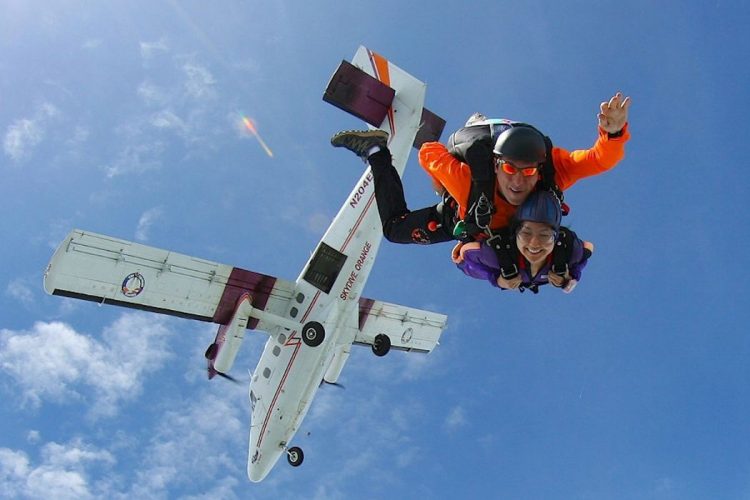 An Algarve guest with instructor on a Tandem skydive near Portimao