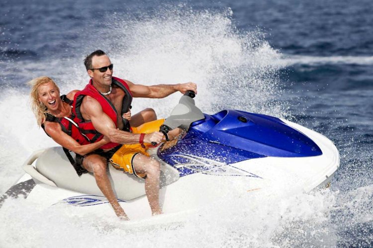 Two excited guests try a jet ski in Luz near Lagos