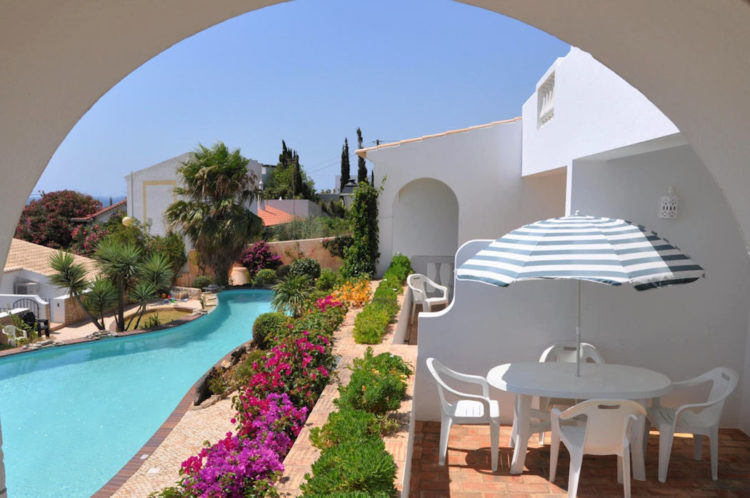 The view from the two bedroom apartment faces the pool and large public terrace and bbq area