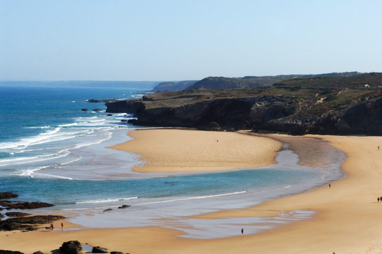 The views over Monte Clerigo beach show one of the biggest beaches in the Algarve as well as its dramatic dark cliffs