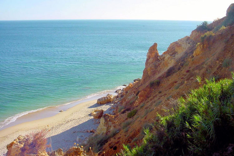 The access down to the beach is steep but offers creamy sand and clear waters for those willing to make the effort